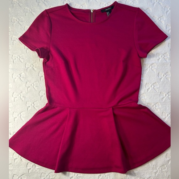 Forever 21 Tops - Rich magenta Forever 21 knit
Peplum top
Hardly worn EUC